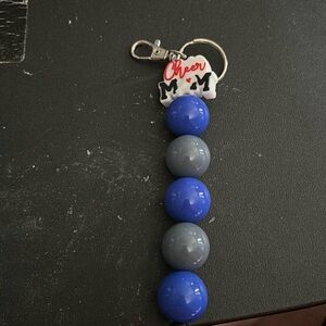 A cheer mom keychain